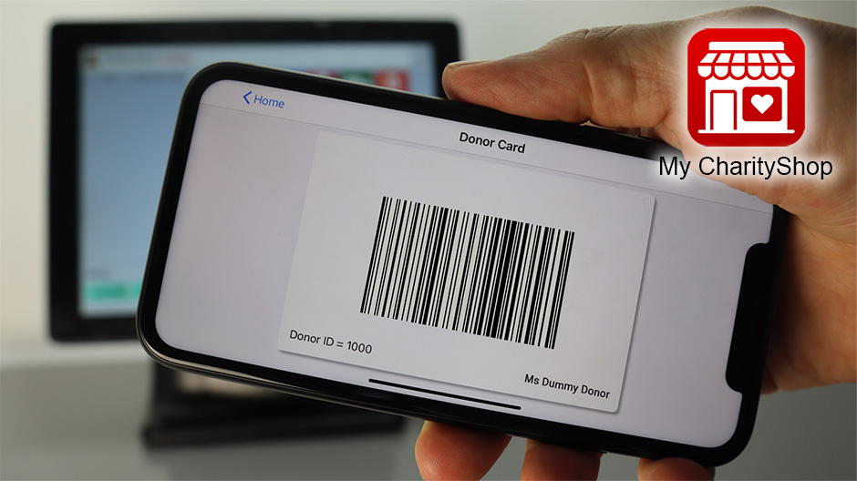 A photo of a smart phone in a users hand, showing a Donor barcode 